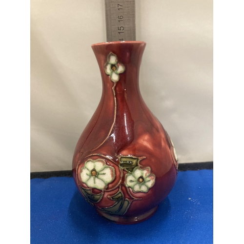 7 - A MINTON SECESSIONIST VASE IN RED WITH CREAM FLOWERS CIRCA 1910 MARKED TO THE BASE  MINTONS LTD No 3... 