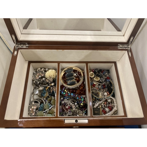 37 - A JEWELLERY BOX WITH LIFT UP MIRROR LID AND  TWO INNER TRAYS