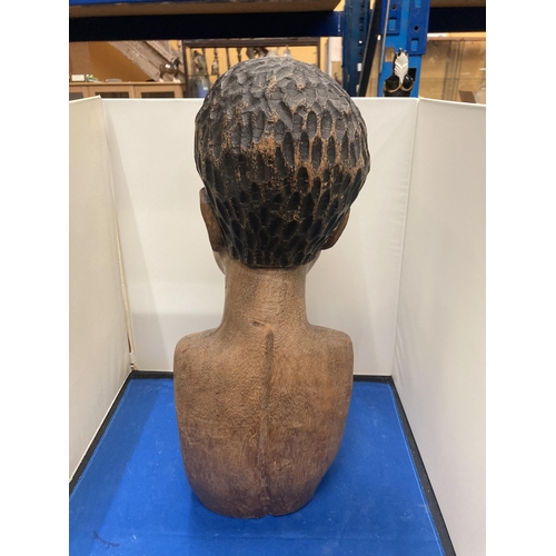 52 - A CARVED TRIBAL BUST HEIGHT APPROX 44CM