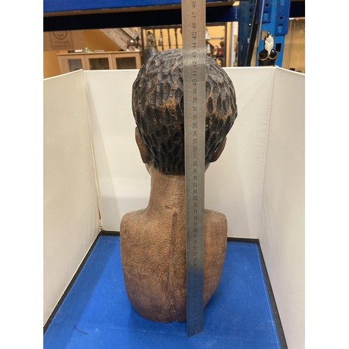 52 - A CARVED TRIBAL BUST HEIGHT APPROX 44CM