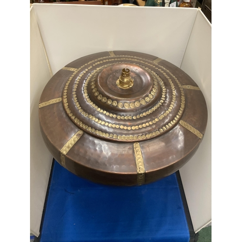 56 - A LARGE INDIAN STYLE BRASS AND COPPER LAMP BASE HEIGHT APPROX 36CM