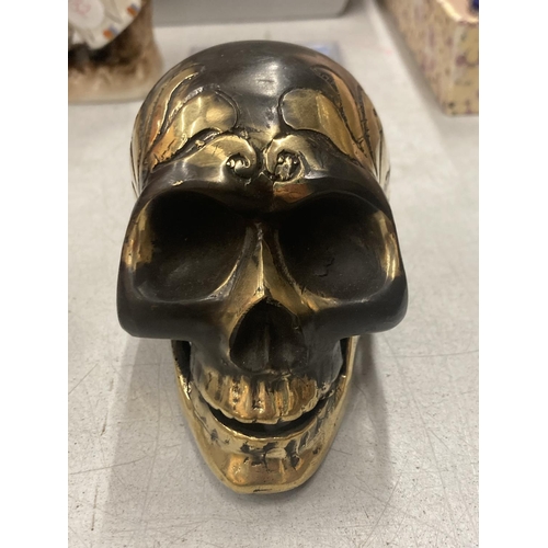 921 - A BRONZE SKULL