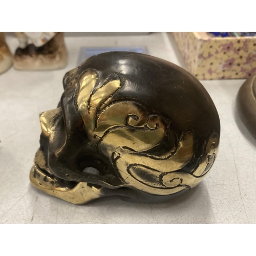 921 - A BRONZE SKULL