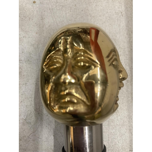 926 - A BRASS FOUR FACED BUDDHA HANDLE WALKING STICK