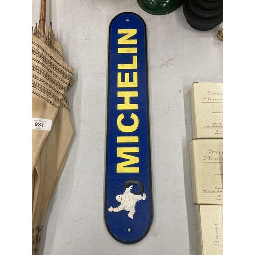 930 - A CAST BLUE AND YELLOW MICHELIN SIGN