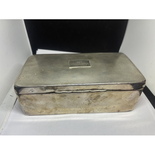 76 - A LARGE HALLMARKED BIRMINGHAM SILVER CIGARETTE BOX ENGRAVED TO THE LID WITH WOOD LINING