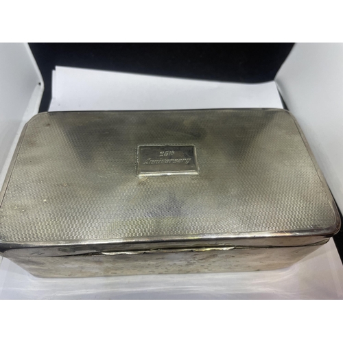 76 - A LARGE HALLMARKED BIRMINGHAM SILVER CIGARETTE BOX ENGRAVED TO THE LID WITH WOOD LINING