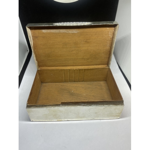 77 - A HALLMARKED LONDON SILVER CIGARETTE BOX ENGRAVED TO LID AND WOOD LINED