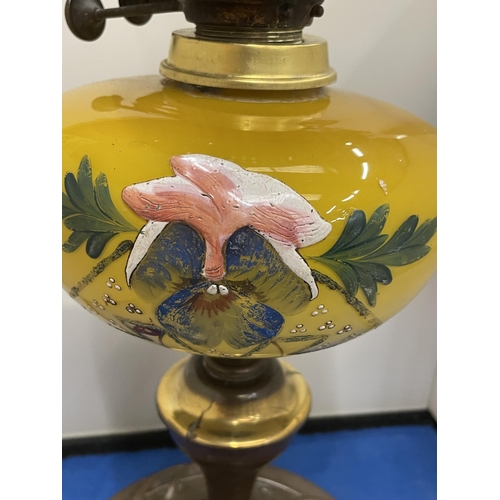 83 - AN ART NOUVEAU COPPER AND PAINTED GLASS OIL LAMP