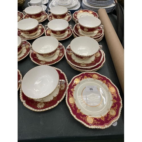 86 - AN EIGHTY EIGHT PIECE ROYAL WORCESTER HATFIELD RED DINNER SERVICE GOLD SHELLS AND LEAVES WITH A RED ... 