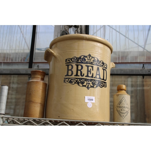 1589 - A VINTAGE STONEWARE BREAD BIN AND TWO STONEWARE BOTTLES