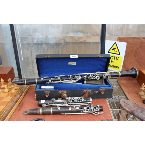 1592 - A BELIEVED COMPLETE VINTAGE JACQUES ALBERT CLARINET WITH CARRY CASE AND AN ASSORTMENT OF BOOZY CLARI... 