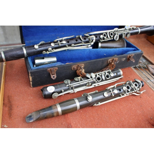 1592 - A BELIEVED COMPLETE VINTAGE JACQUES ALBERT CLARINET WITH CARRY CASE AND AN ASSORTMENT OF BOOZY CLARI... 