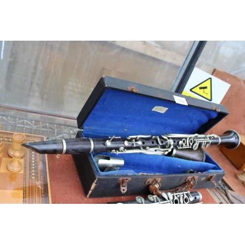 1592 - A BELIEVED COMPLETE VINTAGE JACQUES ALBERT CLARINET WITH CARRY CASE AND AN ASSORTMENT OF BOOZY CLARI... 