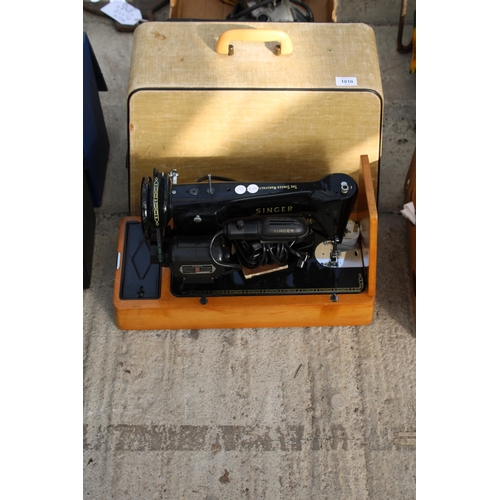 1810 - AN ELECTRIC SINGER SEWING MACHINE WITH FOOT PEDAL AND CARRY CASE, WORKING AT TIME OF CATALOGUING, NO... 