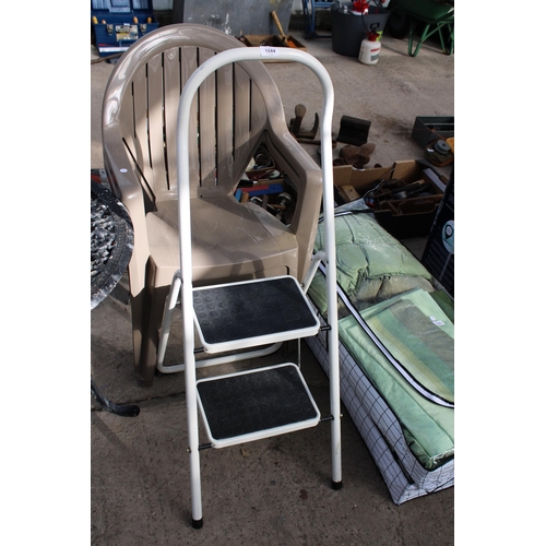 1844 - TWO PLASTIC STACKING GARDEN CHAIRS AND A NON SLIP TWO RUNG STEP LADDER