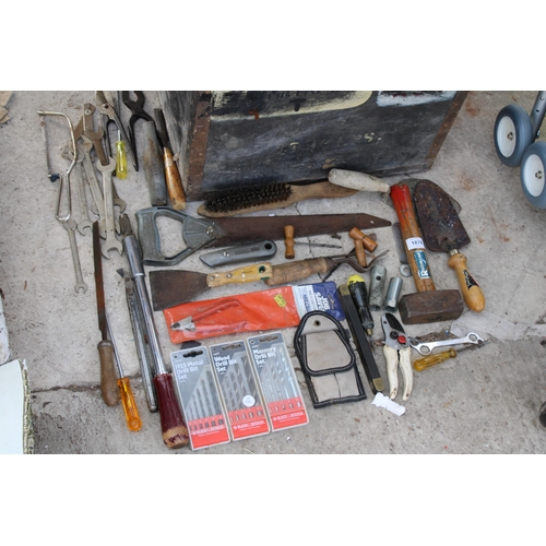 1878 - A WOODEN TOOL CHEST WITH AN ASSORTMENT OF HAND TOOLS TO INCLUDE SPANNERS, HAMMERS AND SAWS ETC