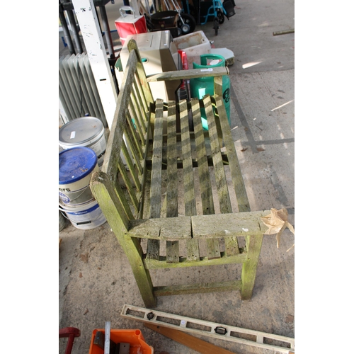 1882 - A WOODEN SLATTED GARDEN BENCH