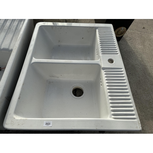 2023 - A DOUBLE WHITE BELFAST SINK AND A FURTHER BELFAST SINK WITH DRAINING BOARD