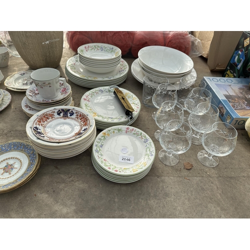 2046 - A LARGE ASSORTMENT OF CERAMICS AND GLASS WARE TO INCLUDE BOWLS, PLATES AND CUPS AND SAUCERS ETC