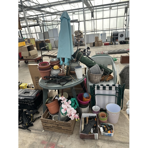 2054 - A LARGE ASSORTMENT OF GARDEN ITEMS TO INCLUDE A PLASTIC TABLE, HANGING BASKET BRACKETS, PLANTERS AND... 