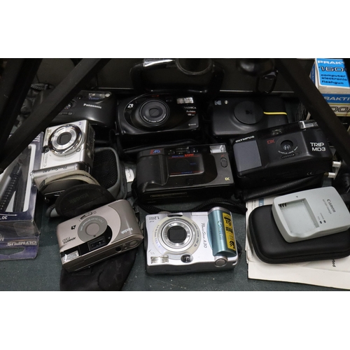 1003 - A LARGE QUANTITY OF CAMERAS AND ACCESSORIES TO INCLUDE A CANON EOS 500 WITH CASE AND STRAP, OLYMPUS,... 