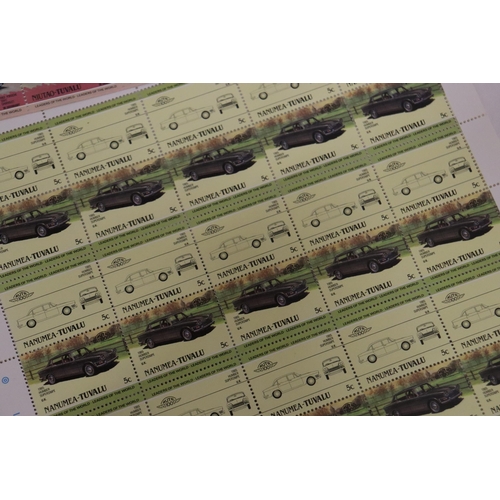 1004 - A COLLECTION OF FULL SHEETS OF CLASSIC CAR STAMPS