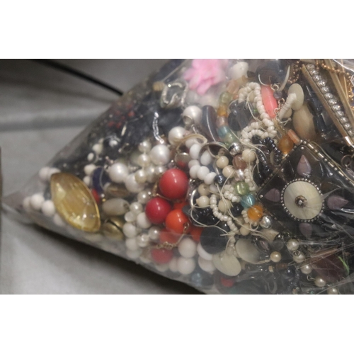 988 - A LARGE QUANTITY OF VINTAGE COSTUME JEWELLERY AND BEADS - 12 KG IN TOTAL