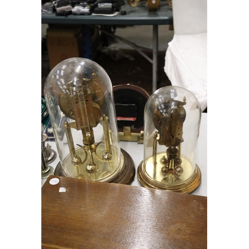 993 - TWO VINTAGE ANNIVERSARY CLOCKS IN DOMES PLUS A MANTLE CLOCK