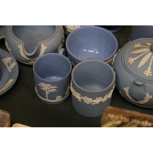 998 - A COLLECTION OF POWDER BLUE WEDGWOOD JASPERWARE TO INCLUDE A TEAPOT, CUPS, SAUCERS, JUGS, BOWLS, ETC