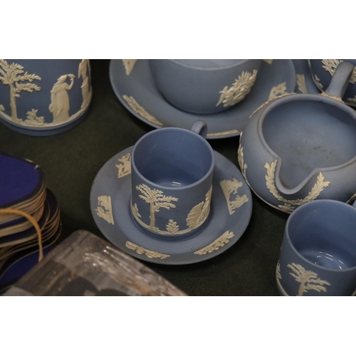 998 - A COLLECTION OF POWDER BLUE WEDGWOOD JASPERWARE TO INCLUDE A TEAPOT, CUPS, SAUCERS, JUGS, BOWLS, ETC