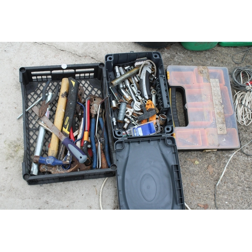 2211 - FOUR PLASTIC FUEL CANS, TWO WATERING CANS AND AN ASSORTMENT OF HAND TOOLS