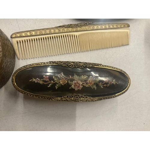 150A - A VINTAGE PETIT POINT DRESSING TABLE SET TO INCLUDE BRUSHES, A COMB, HAND MIRROR AND TRINKET POT