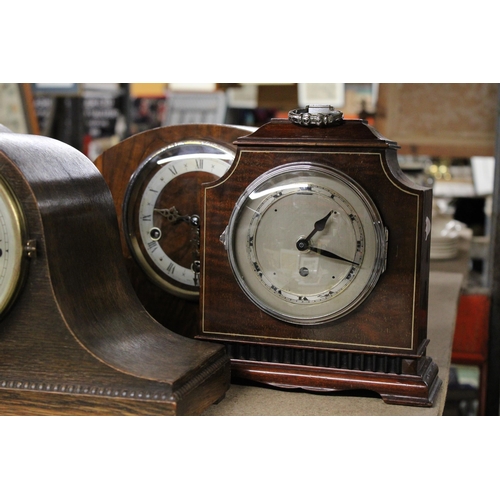 1191 - FOUR VINTAGE MANTEL CLOCKS IN WOODEN CASES