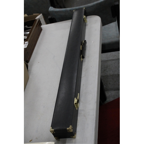 1205 - A DECORATIVE POOL CUE IN  A HARD CASE