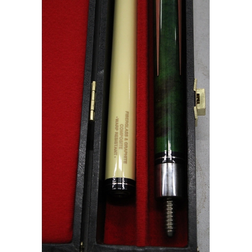 1205 - A DECORATIVE POOL CUE IN  A HARD CASE