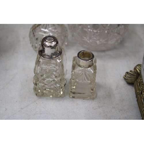 25A - FOUR GLASS ITEMS WITH HALLMARKED SILVER TOPS