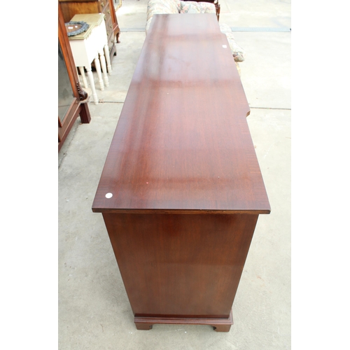 3136 - A MAHOGANY AND CROSS BANDED BREAKFRONT REPRODUX SIDEBOARD ENCLOSING FOUR DRAWERS AND FOUR CUPBOARDS,... 