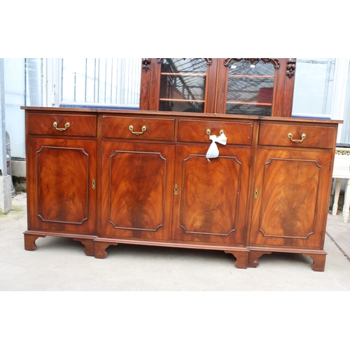 3136 - A MAHOGANY AND CROSS BANDED BREAKFRONT REPRODUX SIDEBOARD ENCLOSING FOUR DRAWERS AND FOUR CUPBOARDS,... 