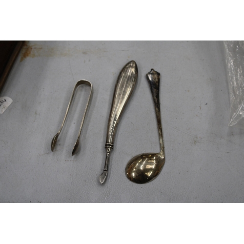 91 - THREE MARKED SILVER ITEMS TO INCLUDE A GOLF CLUB SHAPED SPOON, SUGAR TONGS AND A MANICURE TOOL