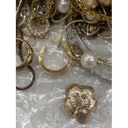 129 - A QUANTITY OF YELLOW METAL COSTUME JEWELLERY