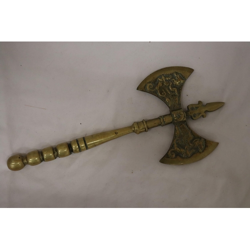 166 - A SOLID BRASS DOUBLE SIDED BATTLE AXE