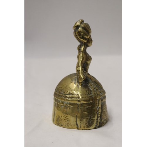 179 - A VINTAGE BRASS BELL MODELLED AS A VICTORIAN WOMAN