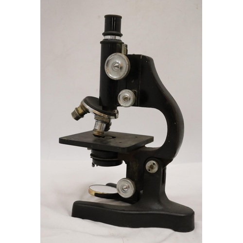 225 - AN ERNST LEITZ WETZLAR MICROSCOPE, NO. 324603, WITH WOOD TRAY AND SPARE LENS