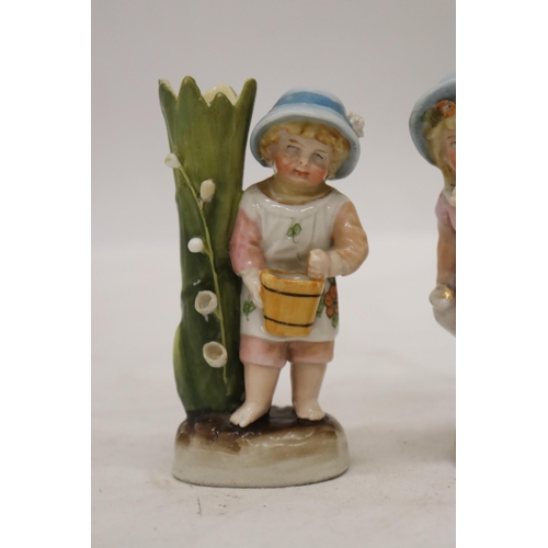 229 - TWO VINTAGE GERMAN CONTA AND BOHME FAIRINGS TO INCLUDE A GIRL WITH JUG VASE AND A GIRL WITH BASKET V... 