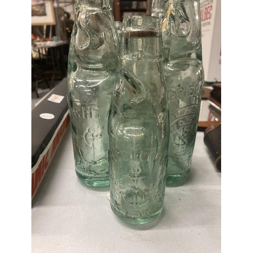 250A - FIVE VINTAGE GLASS COD BOTTLES WITH MARBLE STOPPERS