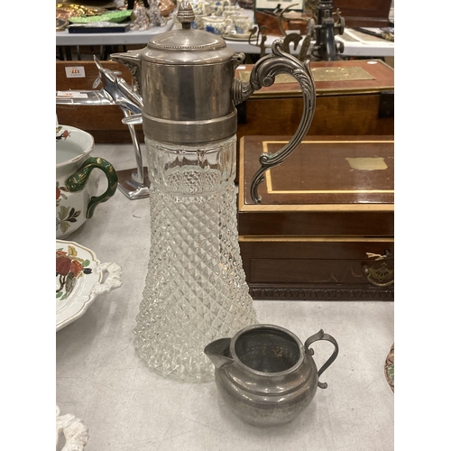 257 - A CUT GLASS CLARET JUG WITH SILVER PLATED TOP AND A SMALL PEWTER JUG