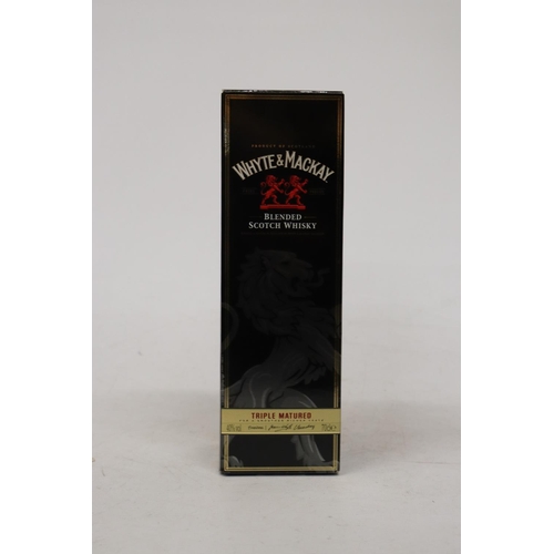 319A - A WHITE AND MACKAY BLENDED SCOTCH WHISKY, BOXED