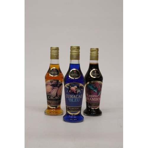 351 - THREE BOTTLES OF VEDRENNE LIQUEUR TO INCLUDE A CURACOA BLEU, A CREME DE CACOA AND A FRAMBOISE