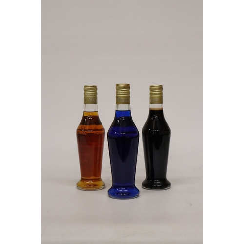 351 - THREE BOTTLES OF VEDRENNE LIQUEUR TO INCLUDE A CURACOA BLEU, A CREME DE CACOA AND A FRAMBOISE